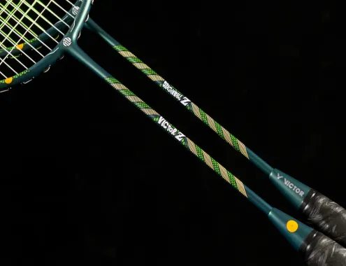 Attach the dragon scales and pattern to the shaft....